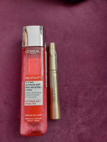 تقویت کننده لورآل پاریس اورجینال L'Oreal Paris PKTGLKLKTNKTLSCPCMSKR Revitalift 5% Pure Glycolic Acid Peeling Effect Tonic 180ml & Telescopic Black Mascara photo review