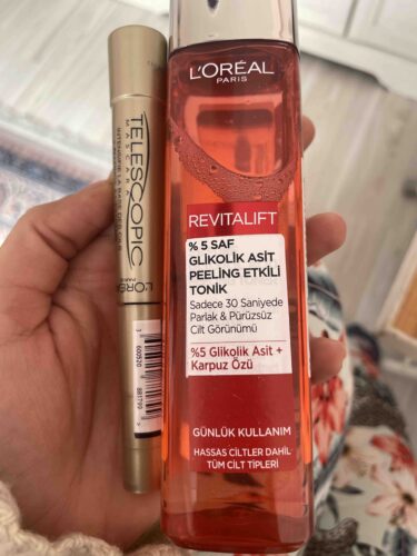 تقویت کننده لورآل پاریس اورجینال L'Oreal Paris PKTGLKLKTNKTLSCPCMSKR Revitalift 5% Pure Glycolic Acid Peeling Effect Tonic 180ml & Telescopic Black Mascara photo review