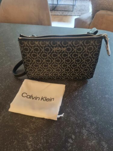 کیف رودوشی کلوین کلاین اورجینال Calvin Klein K60K609417 Black Adjustable Strap Shoulder Bag - Stylish and Suitable for Daily Use photo review